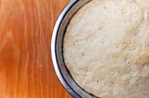Bread dough in a bowl Stock Photos