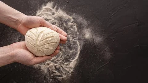Bread dough with dark background Stock Photos