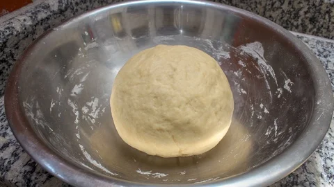 Bread dough during fermentation, growing in size Stock Footage 123543281