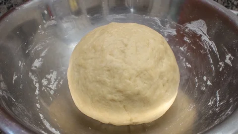 Bread dough during fermentation, growing in size, with zoom effect Stock Footage 123543283