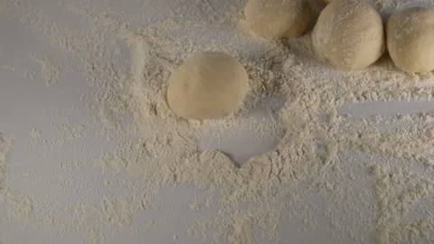 Bread dough into flour Stock Footage 225519606