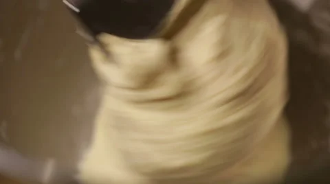 Bread dough kneading automatically using a machine. Stock Footage 68630698