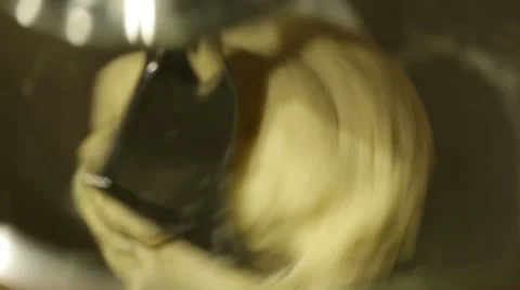 Bread dough kneading automatically using a machine. Stock Footage 68630700