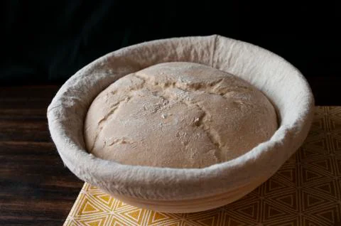 Bread dough loaf raw in proofing basket ,before baking, whole wheat recipe. Rye Stock Photos