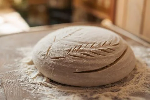 Bread dough with patterns on wooden table Stock Photos