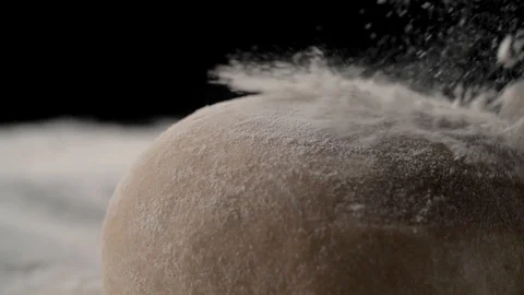Bread dough sprinkled with flour, cooking in slow motion 스톡 동영상 105122158