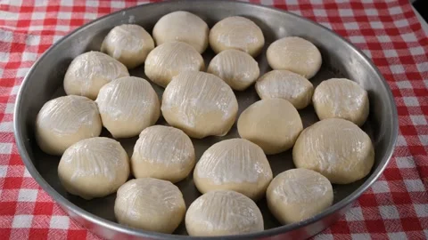 Bread dough in tray Stock Footage 219385295