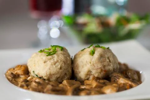 Bread dumpling with mushroom sauce Stock Photos