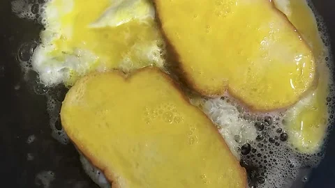 Bread with egg fried in a pan Stock Footage 197791639