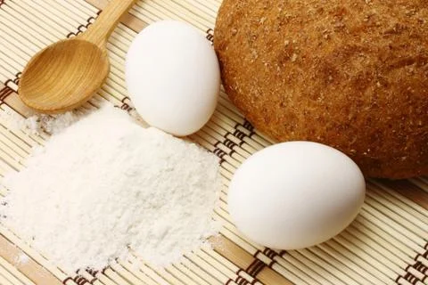 Bread with eggs and flour Stock Photos