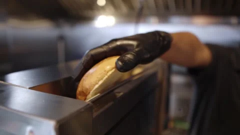 Bread Entering A Toasting Machine Stock Footage 197056500