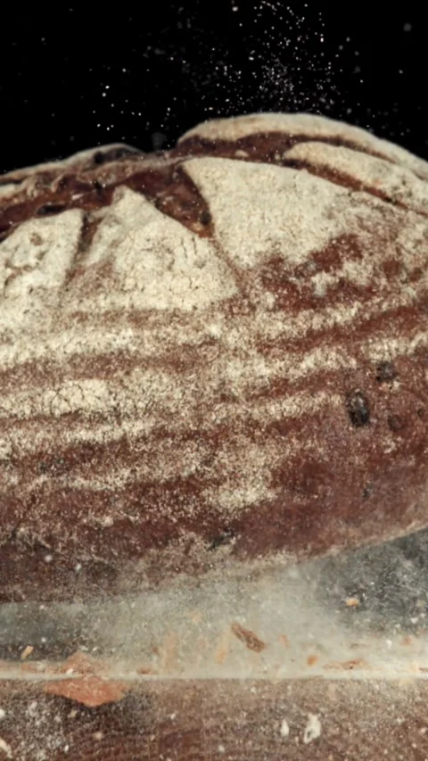 The bread falls on the table. Filmed on a high-speed camera at 1000 fps Stock Footage 335373619