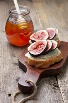 Bread with figs, ricotta Stock Photos