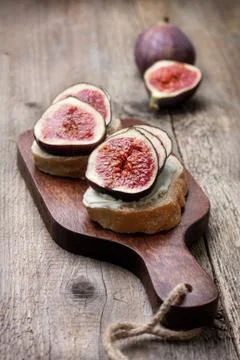 Bread with figs, ricotta Stock Photos