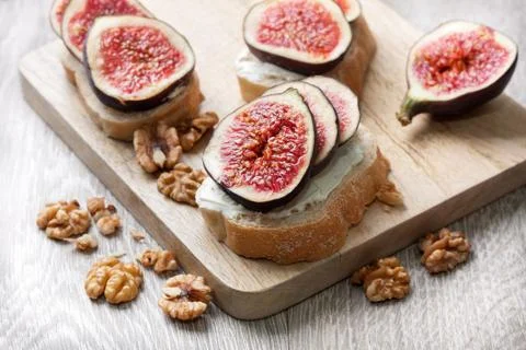 Bread with figs, ricotta Stock Photos