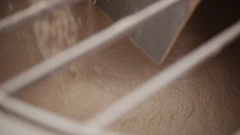 The bread flour flows into a bowl to prepare the dough Video stock 143980558