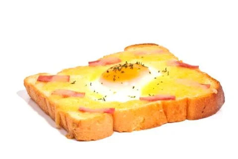 Bread with fried egg and ham Stock Photos
