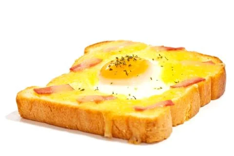 Bread with fried egg and ham Stock Photos