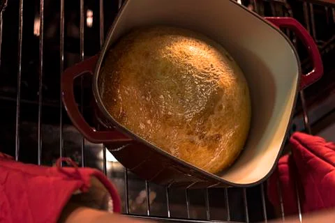 Bread going in the oven Stock Photos