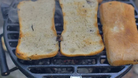 Bread on a grill culinary Stock Footage 113276897