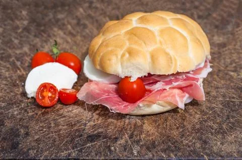Bread ham mozzarella tomatoes sandwich Stock Photos