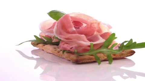 Bread with Ham Slices isolated on white Background Stock Footage 189333396