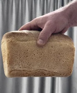 Bread in the hand Stock Photos