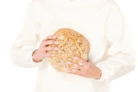 Bread in a hands of a backer Stock Photos