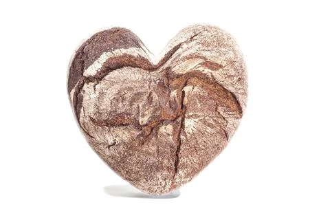 Bread in a heart shape isolated on white background. Foto stock