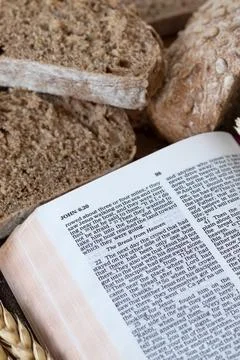 Bread from heaven verses in open holy bible book Photos
