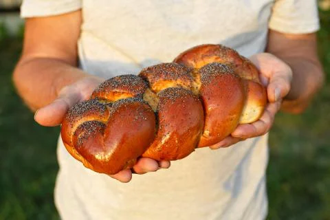 Bread in his hands Stock Photos