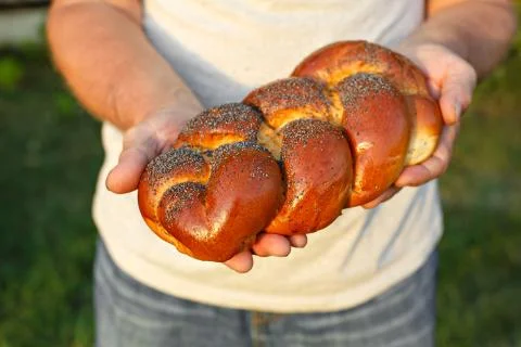 Bread in his hands Stock Photos