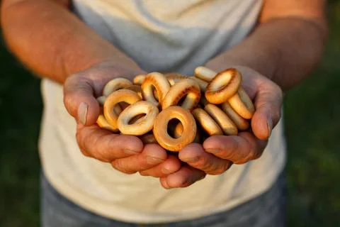 Bread in his hands Stock Photos