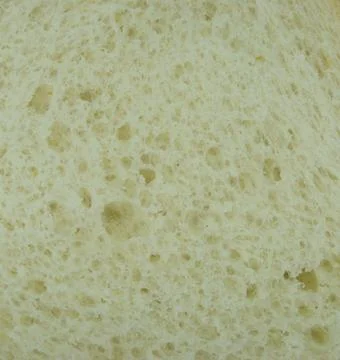 Bread interior texture, slice and interior detail in macro photography Stock Photos