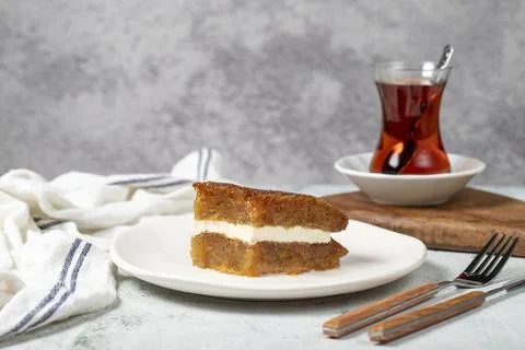 Bread kadayif with cream. Bread kadayif stuffed with cream in the middle. Tra Stock Photos