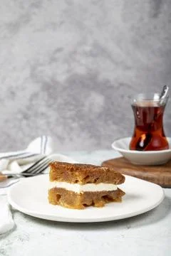 Bread kadayif with cream. Bread kadayif stuffed with cream in the middle. Tra Stock Photos