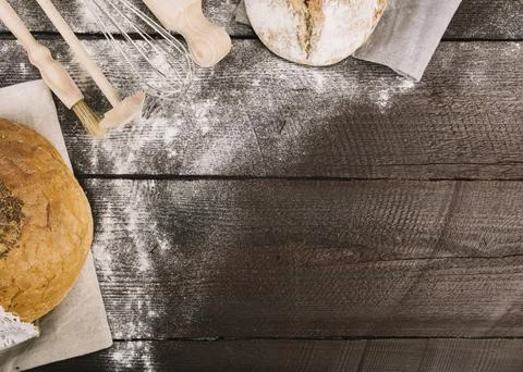 Bread kitchen tools dusted with flour wooden plank Stock Photos