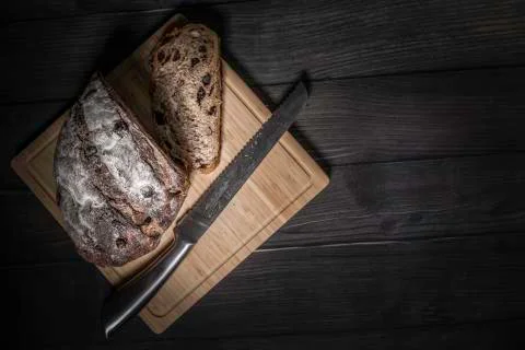 Bread with knife Stock Photos