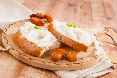 Bread with lard and scratchings. Stock Photos