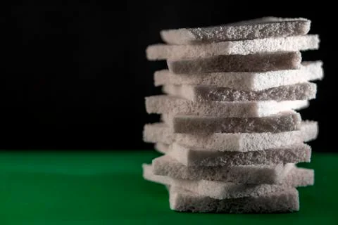 Bread on a light green black background Stock Photos