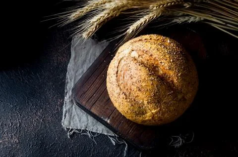 Bread loaf on black background Stock-Fotos