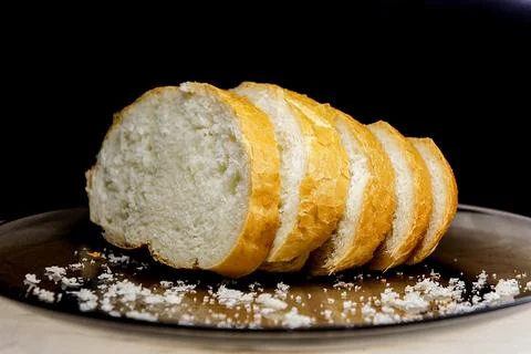 Bread. loaf. white wheat bread. loaf of milk. cut into pieces Stock Photos