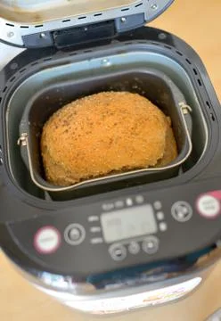 Bread machine and fresh bread at home Free Stock Photos