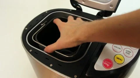 Bread machine for baking being opened inner pot taken out Stock Footage 22208696