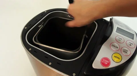 Bread machine for baking being opened inner pot taken out Stock Footage 27245430
