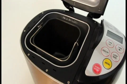 Bread machine for baking being opened inner pot taken out Stock Footage 27364351