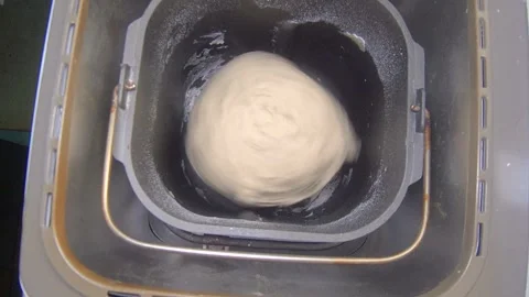 Bread machine dough kneading Stock Footage 250950254