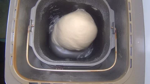 Bread machine dough kneading Stock Footage 250950455