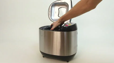 Bread maker for baking being opened Stock Footage 27245509