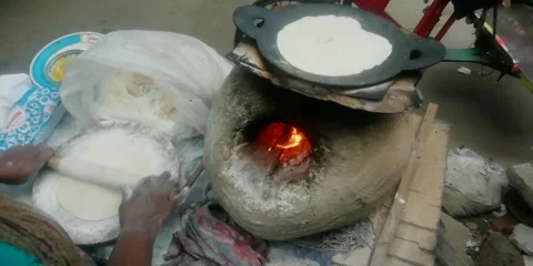 Bread Making on Clay Stove 動画素材 312469132